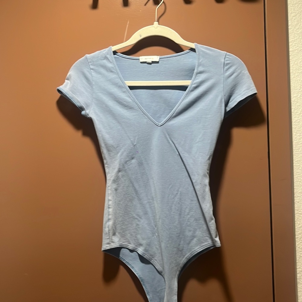 blue body suit